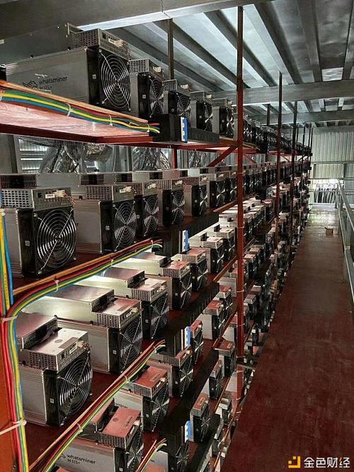 Mining rigs setup in a large warehouse for high cryptocurrency yield